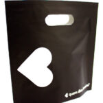 Elegante Papier-Grifflochtasche bedruckt Elegante Papier-Grifflochtasche bedruckt