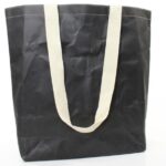 Waschpapier Tragetaschen, schwarz durchgefärbt, bedruckt mit Logo Waschpapier Tragetaschen, schwarz durchgefärbt, bedruckt mit Logo